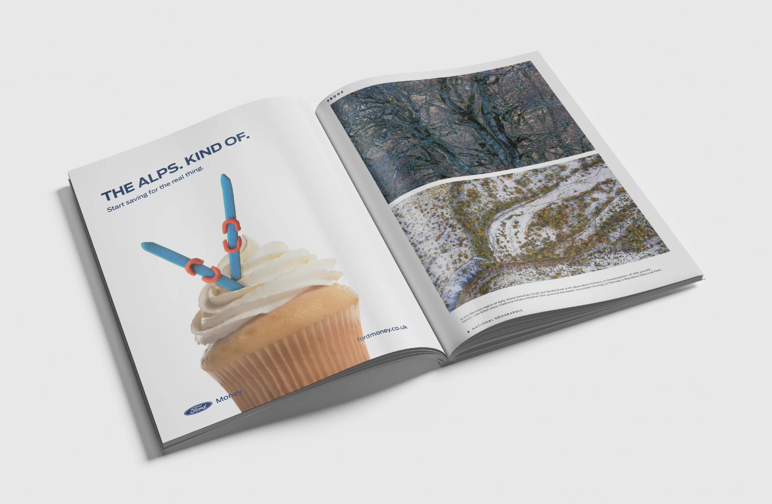 Open magazine with the "The Alps. Kind of." ad — a cupcake with two blue straws planted like skis — facing a photo of a snowy mountainside
