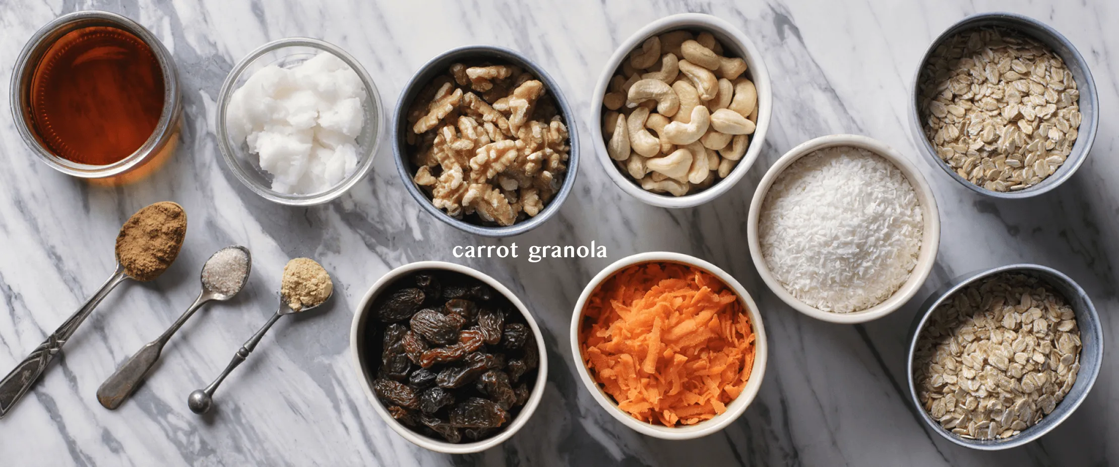 Overhead flat lay of falafel ingredients in small bowls — spices, grains, lentils, nuts and seeds — on grey marble