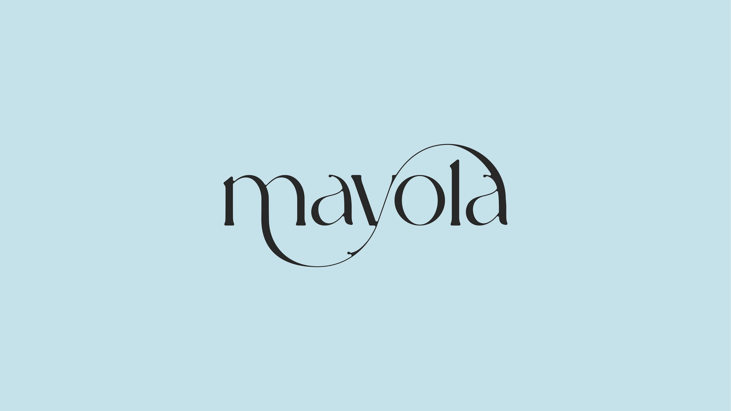 Mayola logotype in an elegant serif with a looping ligature on a pale blue field