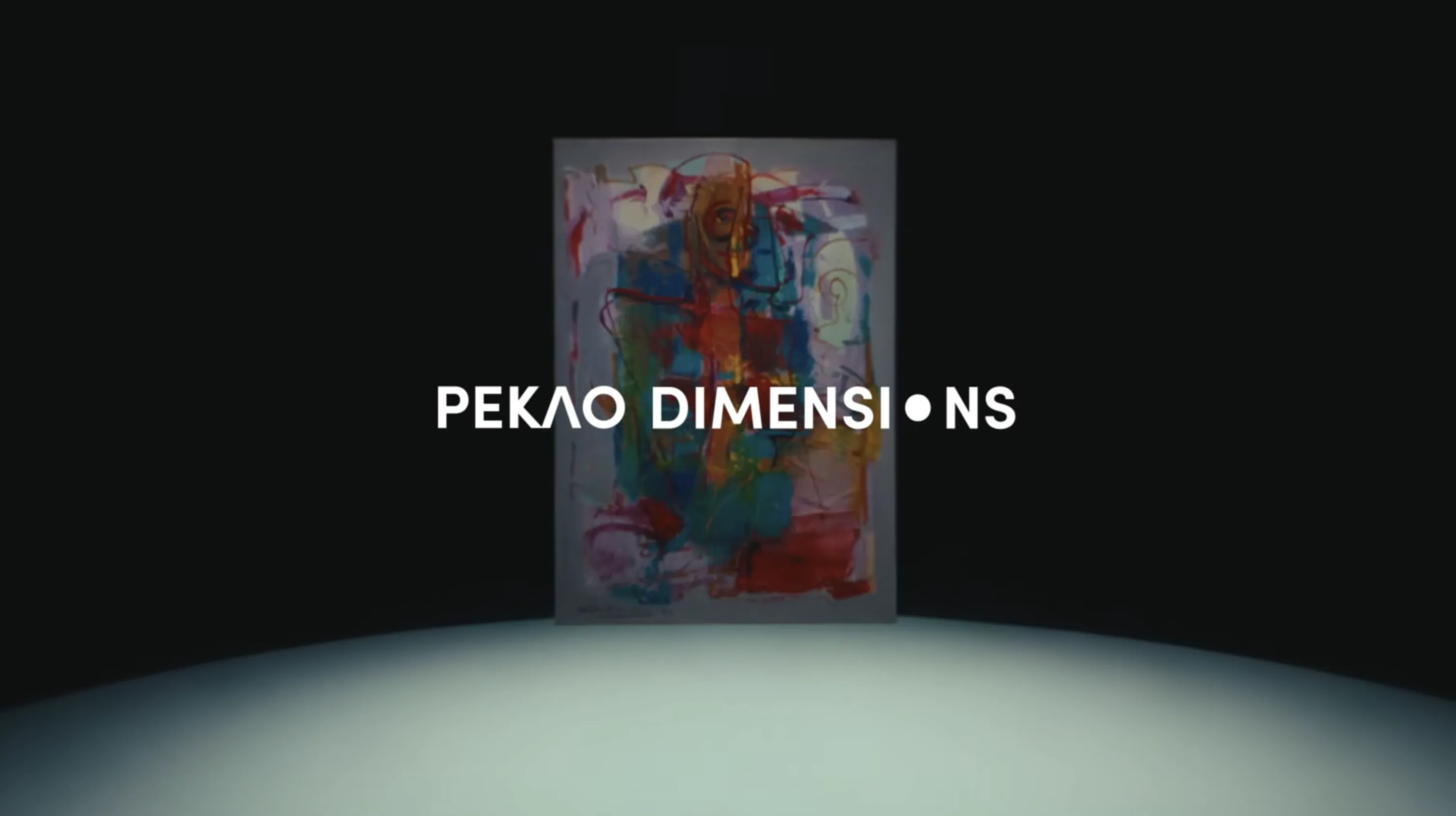 White Pekao Dimensions logotype over a colourful abstract painting standing spotlit on a dark stage