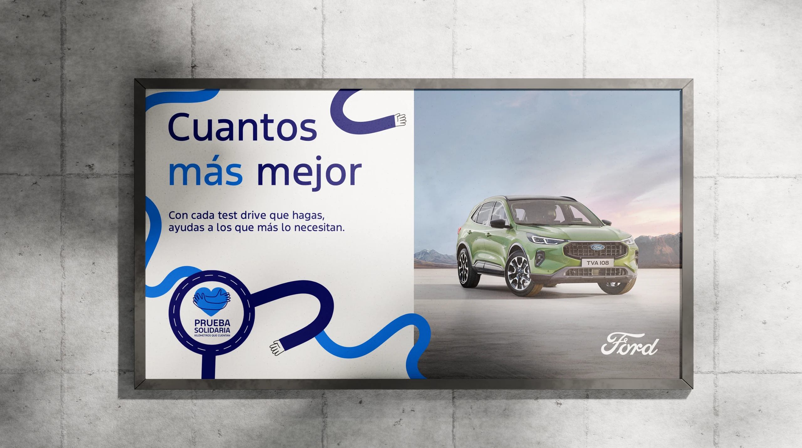 Prueba Solidaria billboard with the headline "Cuantos más mejor", the campaign roundel and a green Ford SUV against mountains